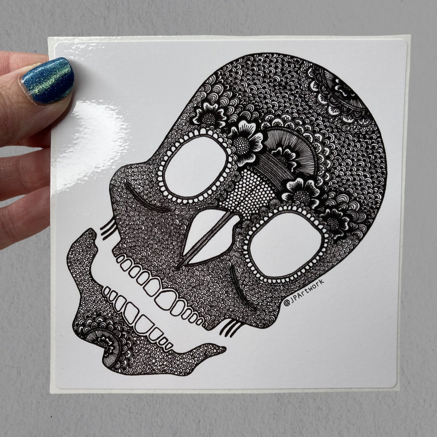 Skull Vinyl Sticker by Jenny Pond